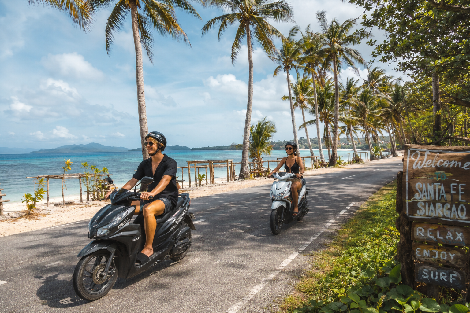 Couple riding scooters along the coast of Santa Fe, Siargao Island
